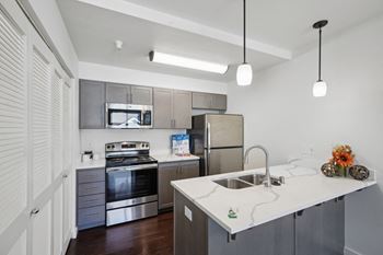 <B>fully-equipped kitchens:</b> kitchens designed with everyday convenience in mind.